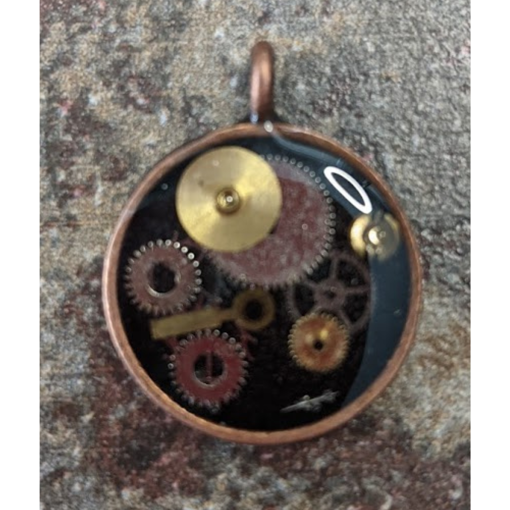 Steampunk Circular Pendant filled with Watch Gears